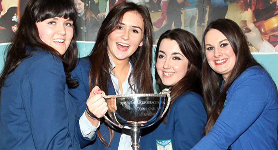Zoe Boland, Emma Dobson and Aisling Hourihane with their Irish teacher, Ms. Samantha Mulcahy who were winners of the 2013 All-Ireland Irish language debating competition